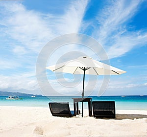 Chairs and umbrella on beach