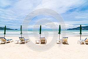 Chairs And Umbrella on the Beach