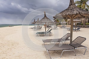 Chairs and umbrellas waiting for tourists