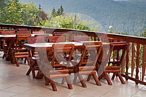 Chairs and wooden table in a terrace