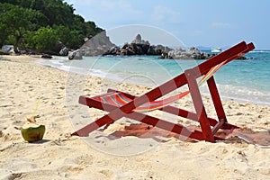Chaise longue on beach