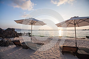 Chaise longues at the beach on the Boracay island, Philippines