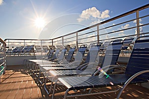 Chaise longues on deck of cruise ship