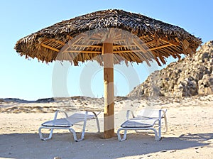 Chaise Lounge Chairs on Beach