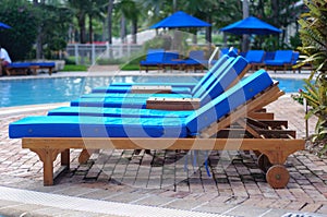 Chaise Lounge Chairs by the Pool photo