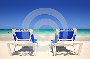 Chaise lounger chairs at beach resort