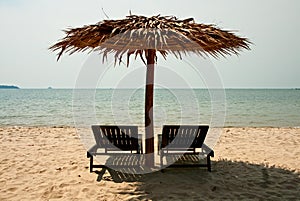 Chaise lounges on a beach
