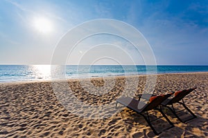 Chaise lounges on a beach