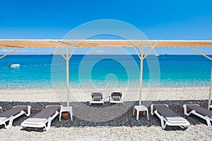 Chaise lounges on the beach in Kemer, Turkey.