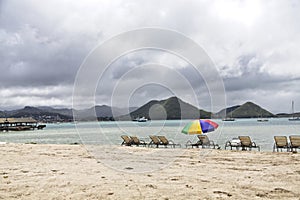 Chaise Lounges and Beach Umbrella