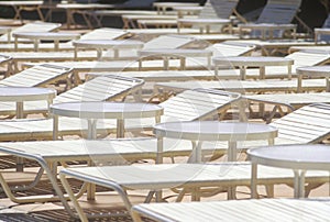 Chaise lounges at poolside, Ritz Carlton, CA