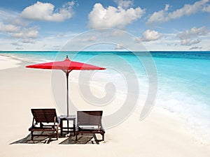 Chaise Lounges with Sun Umbrellas photo