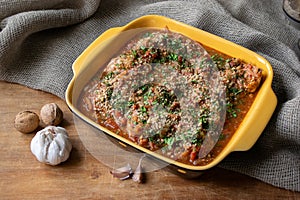 Chakhokhbili with chicken and vegetables Georgian cuisine top view on old wooden table