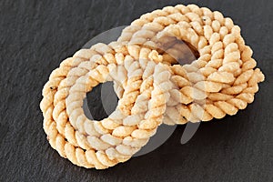 Chakli or Murukku popular vegetarian spiral shaped crisp deep-fried snack.