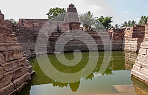 Chakra Gudi temple and its tank at water level  Aihole  Karnataka  India