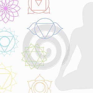 Chakra icons in respective colors with meditating person photo