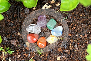 Chakras Stones to Heal stands on the earth to renovate energies