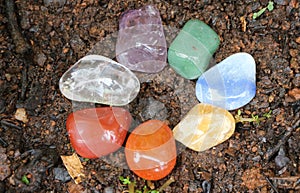 Chakras Stones to Heal stands on the earth to renovate energies