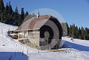 Chalet on snowy mountainside