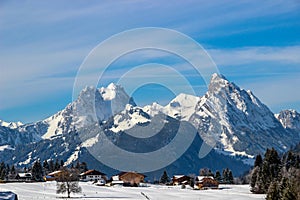 Chalets in front of Gummfluh and RÃ¼bli, SaannemÃ¶ser, Switzerland