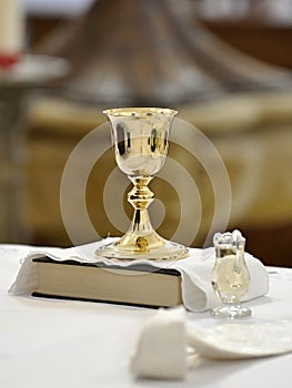 Chalice bible and holy water