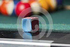 Chalk block on biliard table