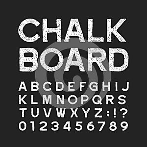 Chalk board alphabet font. Distressed vintage letters and numbers on a dark background.