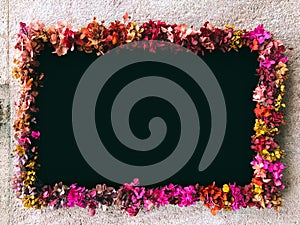 Chalk board framed with flowers