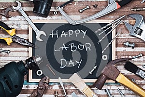Chalk board with text HAPPY LABOR DAY with variety gruge rusty h