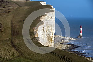 The famous Beachy Head lighthouse and chalk cliffs near Eastbourne in East Sussex, England