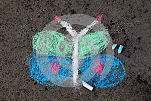 chalk drawing on asphalt: beautiful butterfly