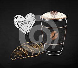 Chalk drawing of paper coffee cup with croissant