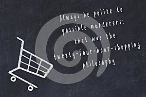 Chalk drawing of shopping cart and short quote about shopping on black board