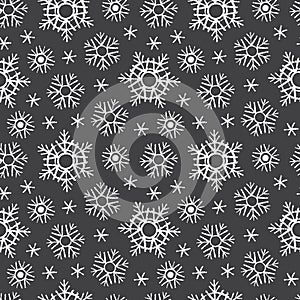 Chalk drawn on black board snowflakes winter seamless pattern