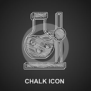 Chalk Glass test tube flask on stand icon isolated on black background. Laboratory equipment. Vector