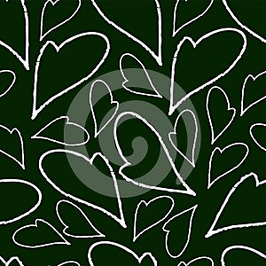 Chalk hearts on a dark green background