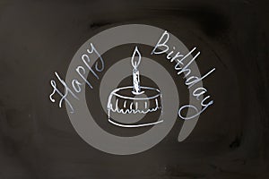 Chalk inscription happy birthday cupcake with candle