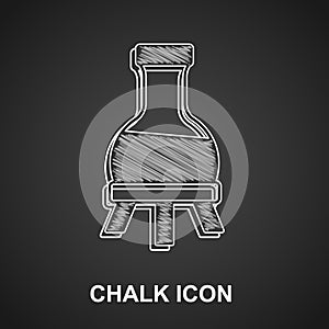 Chalk Test tube and flask chemical laboratory test icon isolated on black background. Laboratory glassware sign. Vector
