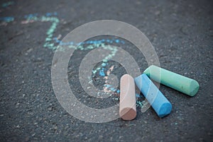 Chalk on Textured Asphalt. Colorful Draw Lines. Childhood and parenting. Education.