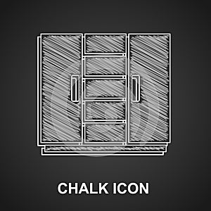 Chalk Wardrobe icon isolated on black background. Vector