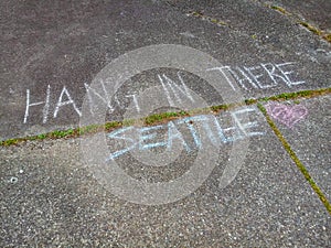 Sidewalk Chalk Writing Hand in There Seattle in a Neighborhood