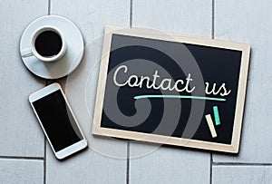 Chalkboard or Blackboard concept saying - Contact Us