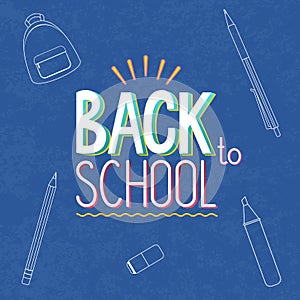 Chalkboard with colorful back to school sign on it