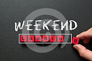 Chalkboard with a concept of weekend loading bar
