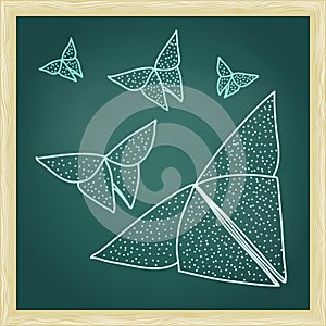 Chalkboard with drawing of origami butterflies in hairline outline style photo