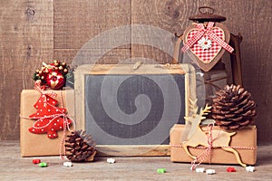 Chalkboard mock up with Christmas gifts and rustic decorations