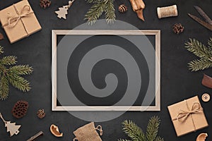 Chalkboard mockup surrounded by Christmas decorations