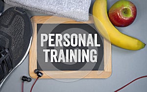 Chalkboard with sport shoes and personal training