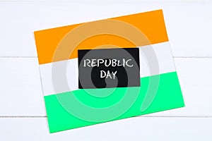 A chalkboard with the text Republic Day written in it and a flag of India.