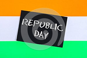 A chalkboard with the text Republic Day written in it and a flag of India.